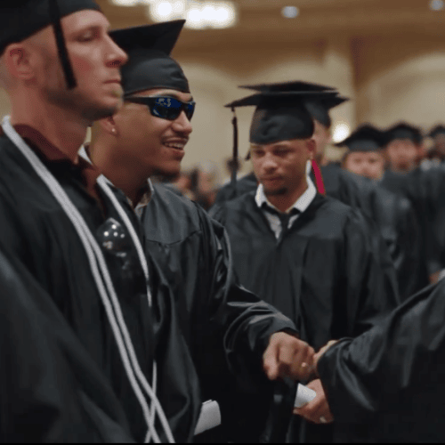 Electical School Grads Fistbumping